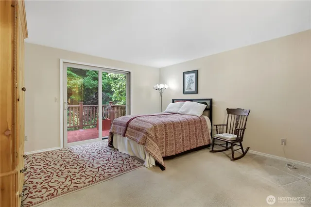 a bathroom with a sink a mirror and a shower