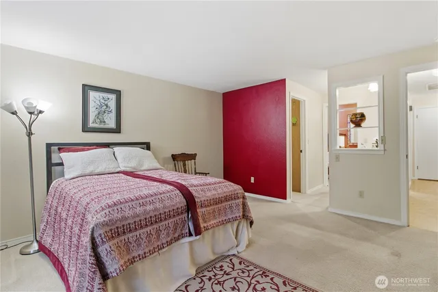 a view of room with workspace and windows