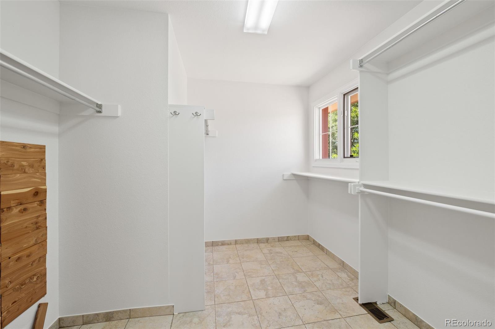 9368 Harvard Drive Highlands Ranch, CO 80130 - Photo 28 of 46 a view of an empty room with a window