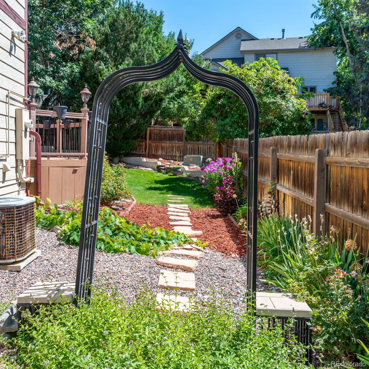 9368 Harvard Drive Highlands Ranch, CO 80130 - Photo 39 of 46 a view of a backyard with plants