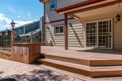 a view of backyard with deck