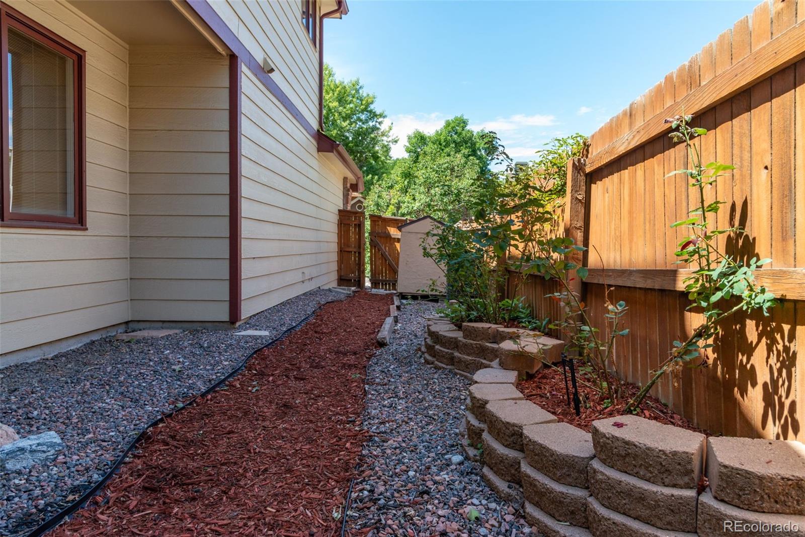 9368 Harvard Drive Highlands Ranch, CO 80130 - Photo 46 of 46 a view of a backyard with sitting area