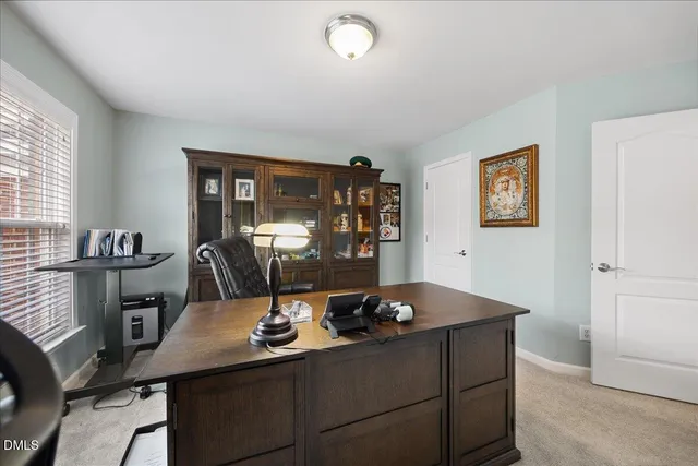 an aerial view of house with yard swimming pool and outdoor seating