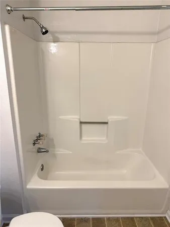 a view of a wooden deck and city view