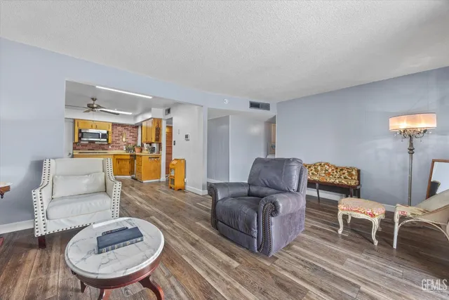 a living room with furniture and a table