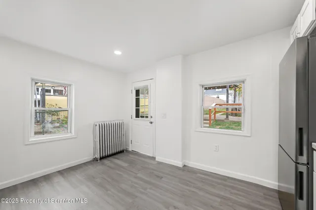 an empty room with windows