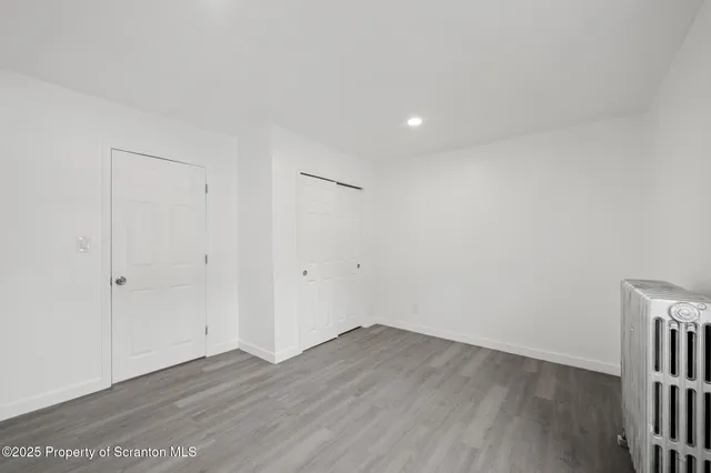 a bathroom with a sink a toilet and tub