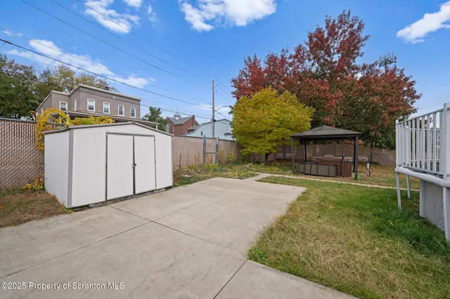 a house with wooden fence
