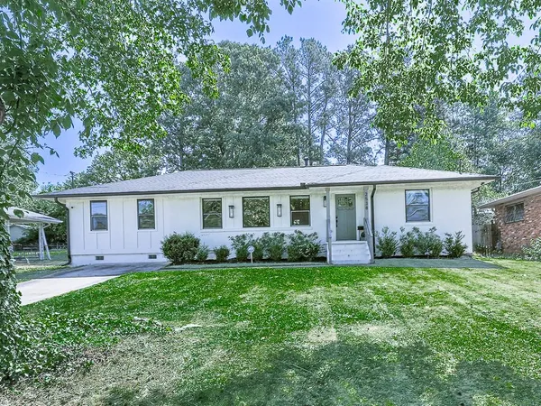 front view of a house with a yard