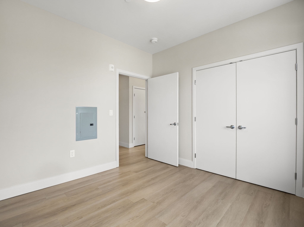 249 Corey Road, Unit 401 Boston, MA 02135 - Photo 11 of 34 a view of an empty room