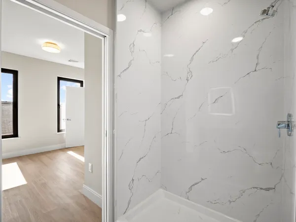 a view of a bathroom with a bathtub