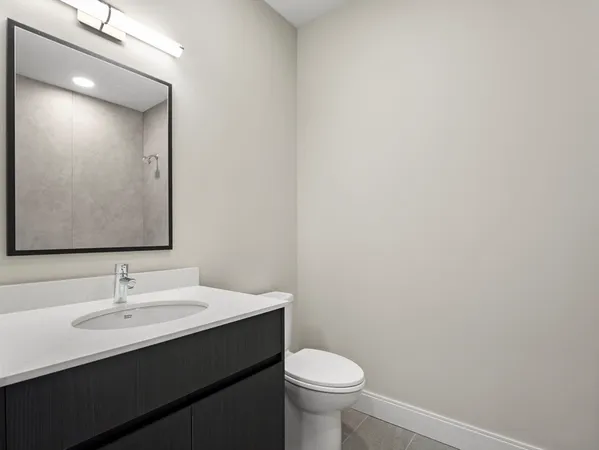 a bathroom with a sink and a toilet