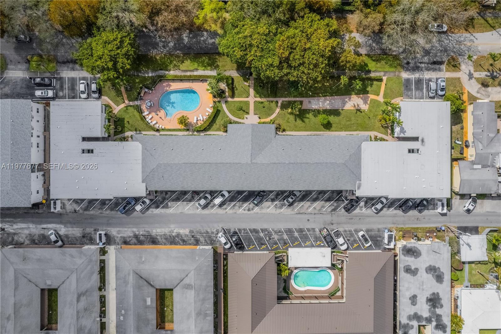 3701 Tyler Street, Unit 211 Hollywood, FL 33021 - Photo 23 of 26 an aerial view of house with a yard