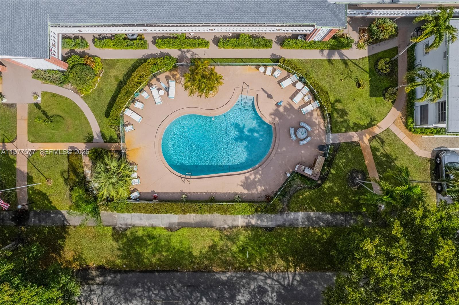 3701 Tyler Street, Unit 211 Hollywood, FL 33021 - Photo 3 of 26 an aerial view of a swimming pool
