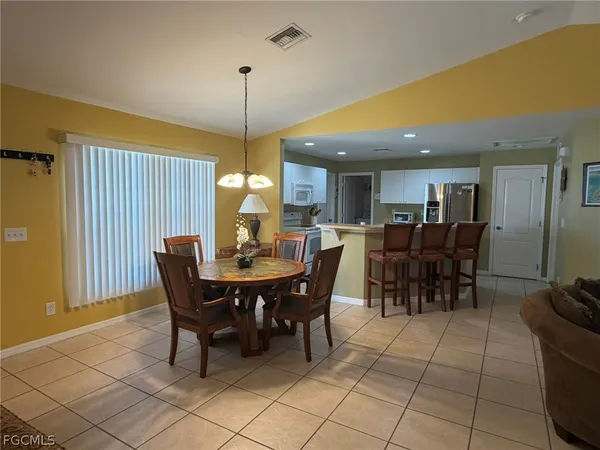 a view of a dining room with furniture