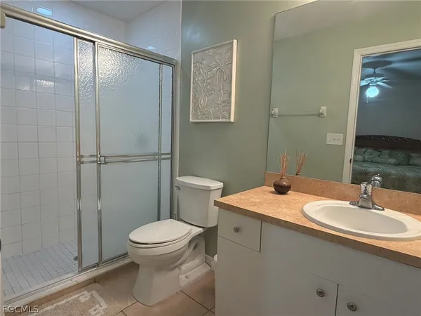 a bathroom with a sink toilet and vanity