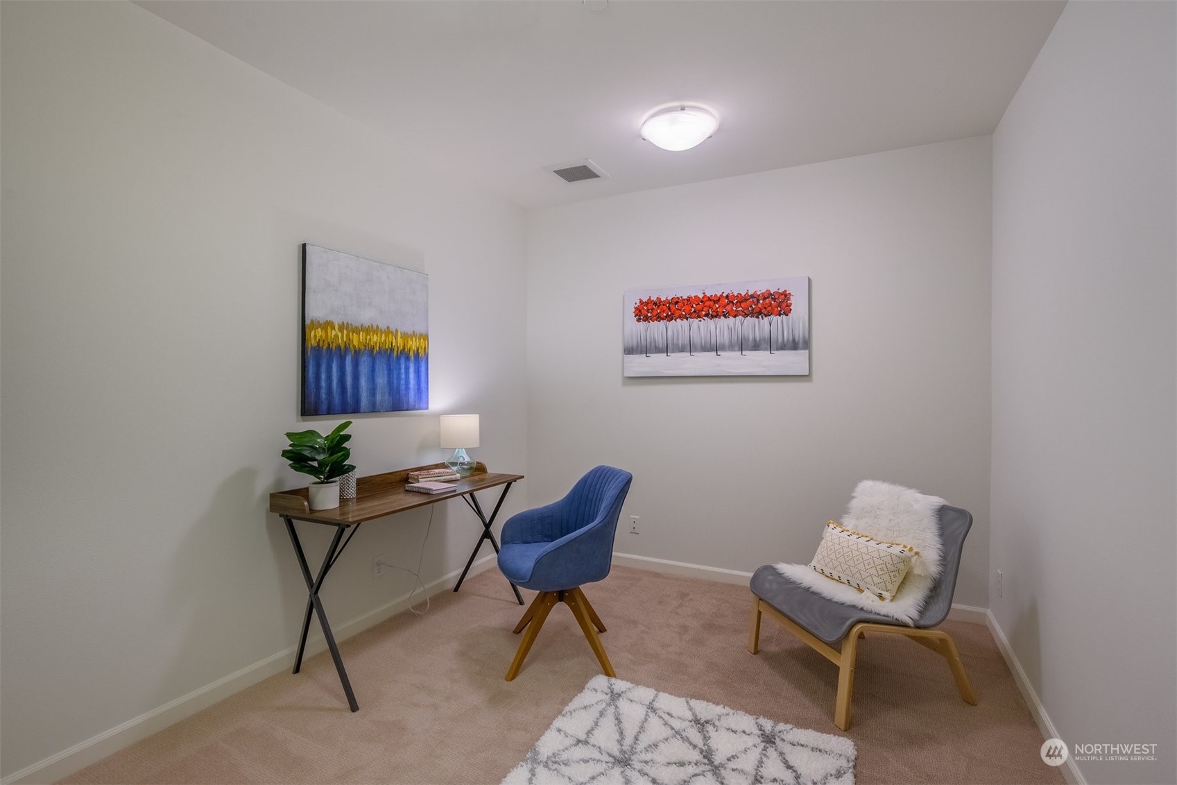505 5th Avenue South, Unit 203 Edmonds, WA 98020 - Photo 19 of 24 a work room with furniture and a chair
