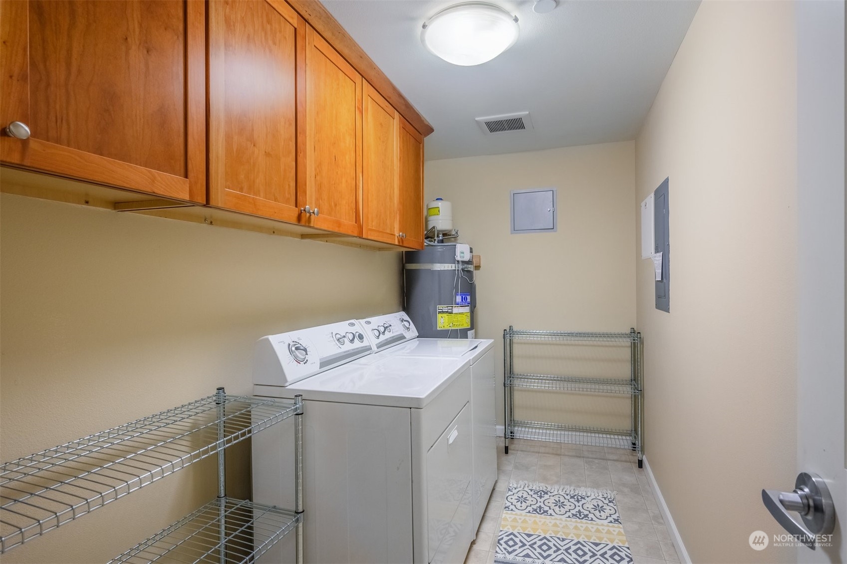 505 5th Avenue South, Unit 203 Edmonds, WA 98020 - Photo 21 of 24 a utility room with dryer and washer