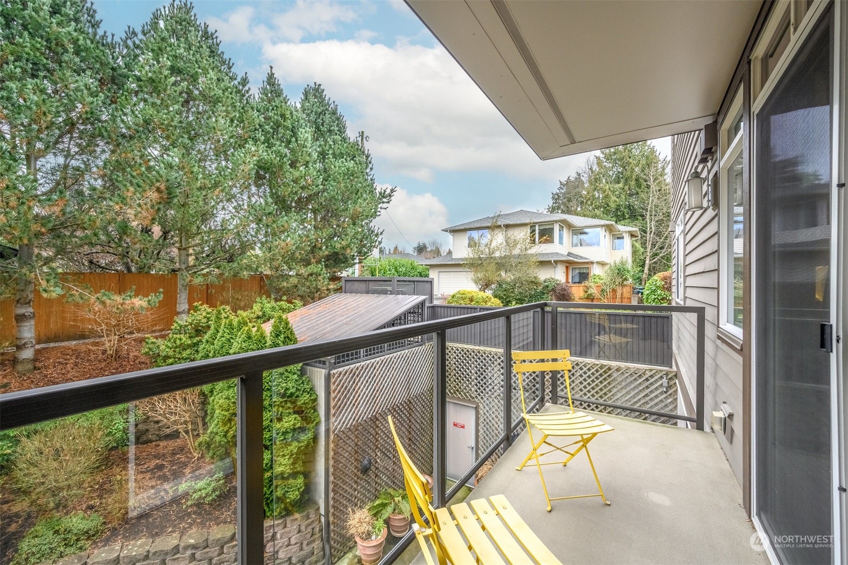 505 5th Avenue South, Unit 203 Edmonds, WA 98020 - Photo 22 of 24 a view of a balcony with chairs