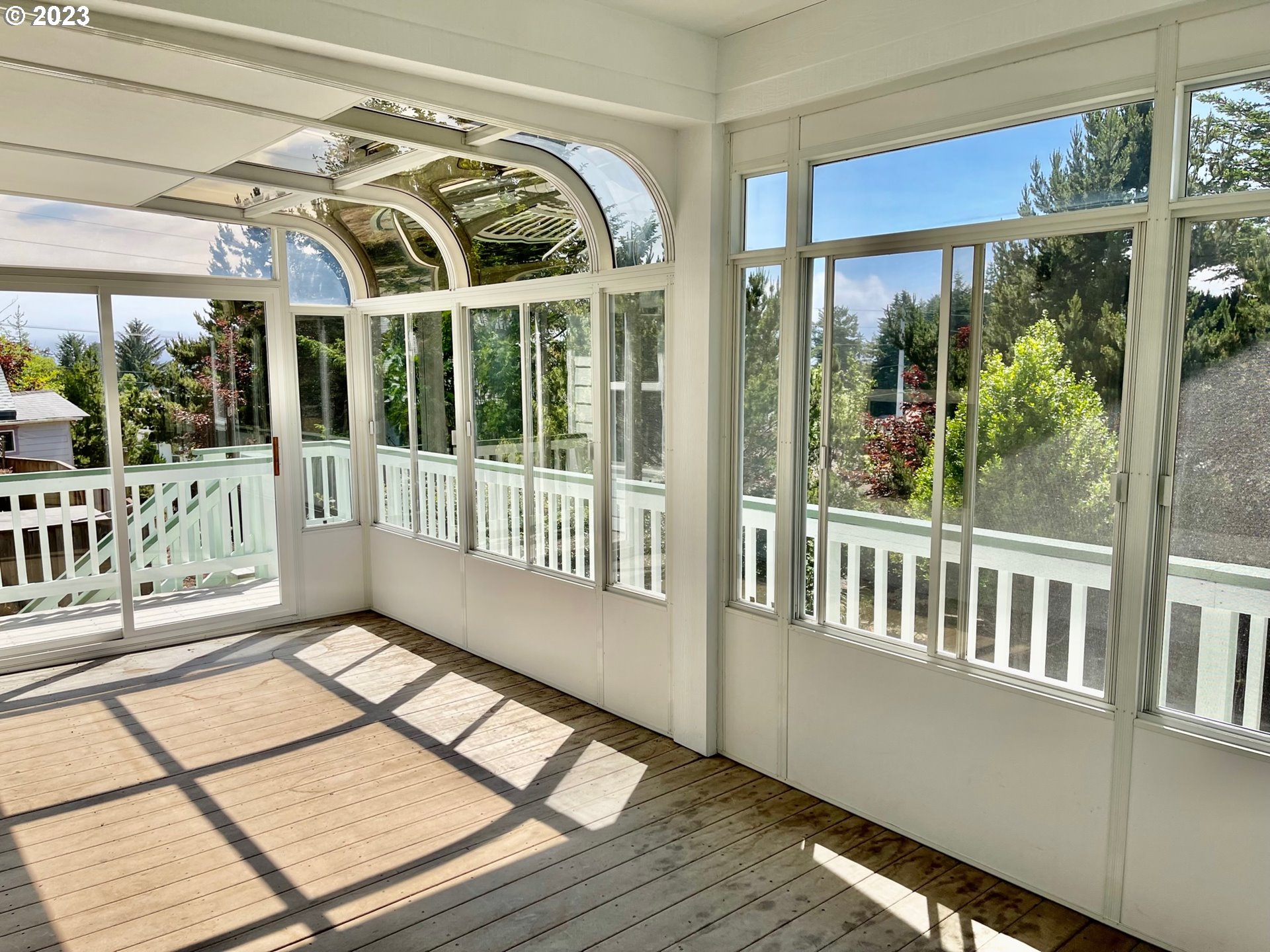 919 3rd Street Brookings, OR 97415 - Photo 14 of 36 a view of a balcony with furniture