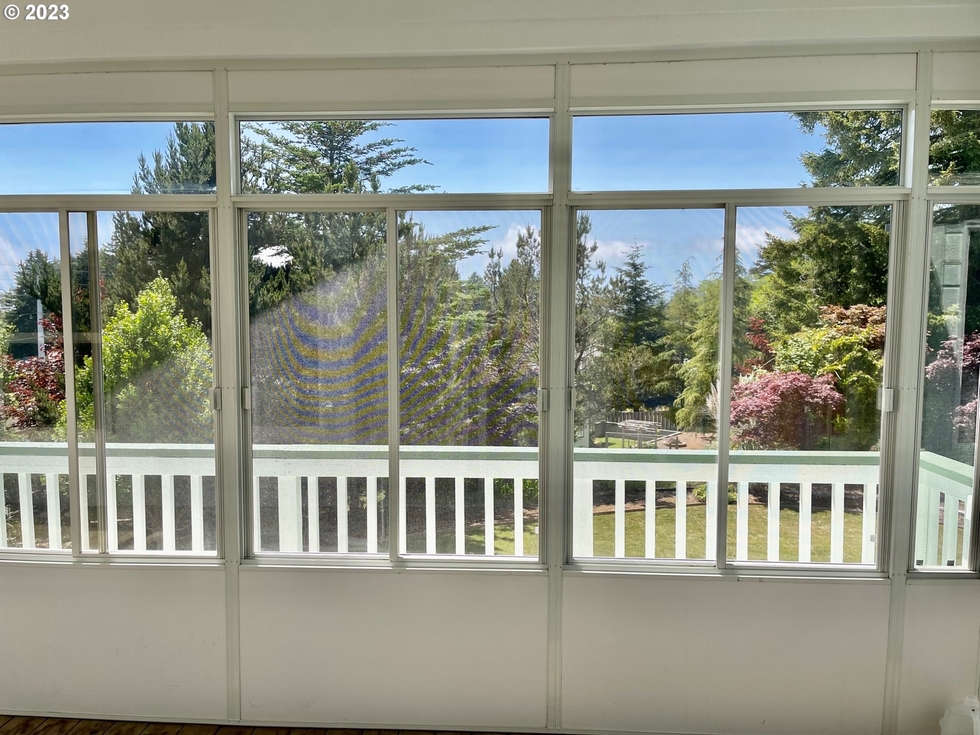 919 3rd Street Brookings, OR 97415 - Photo 15 of 36 a view of a window of a house