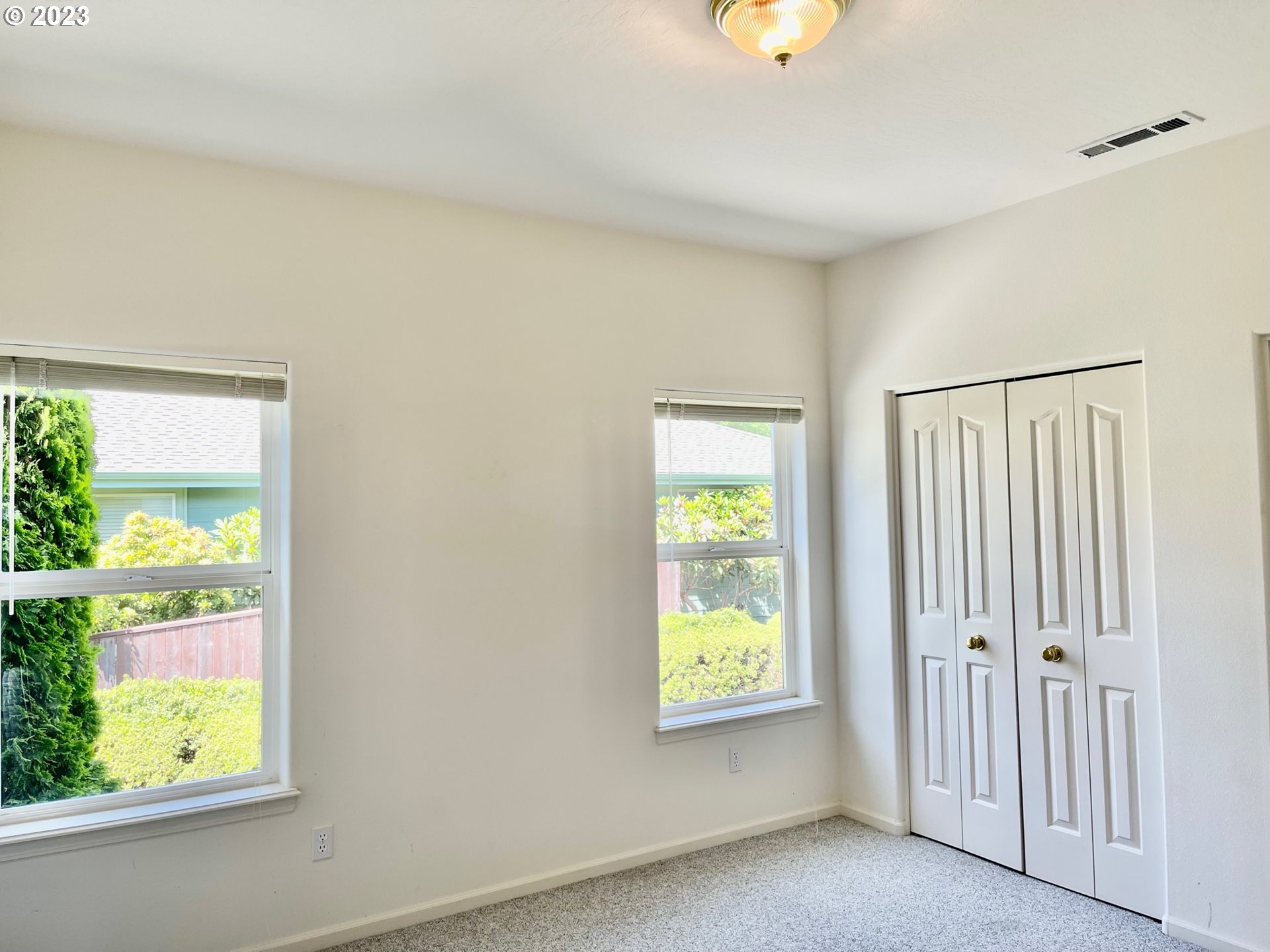 919 3rd Street Brookings, OR 97415 - Photo 24 of 36 a view of an entryway with a window and a bed