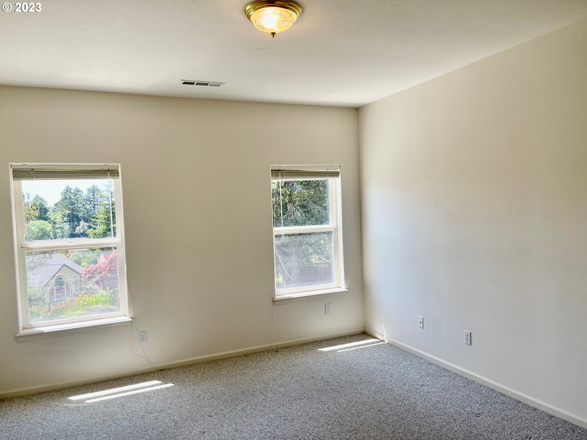 919 3rd Street Brookings, OR 97415 - Photo 25 of 36 an empty room with windows