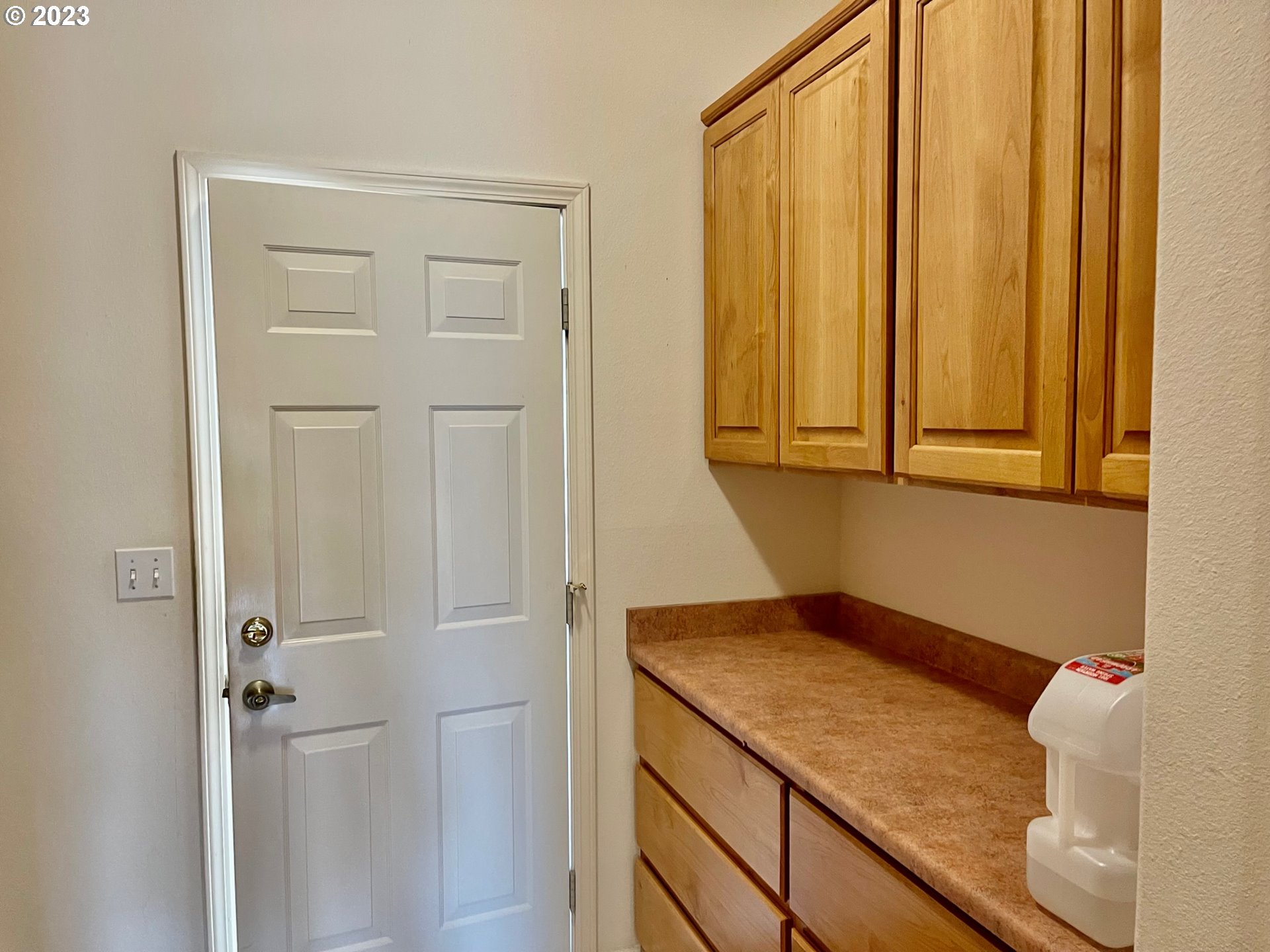 919 3rd Street Brookings, OR 97415 - Photo 29 of 36 a bathroom with a granite countertop sink and a mirror