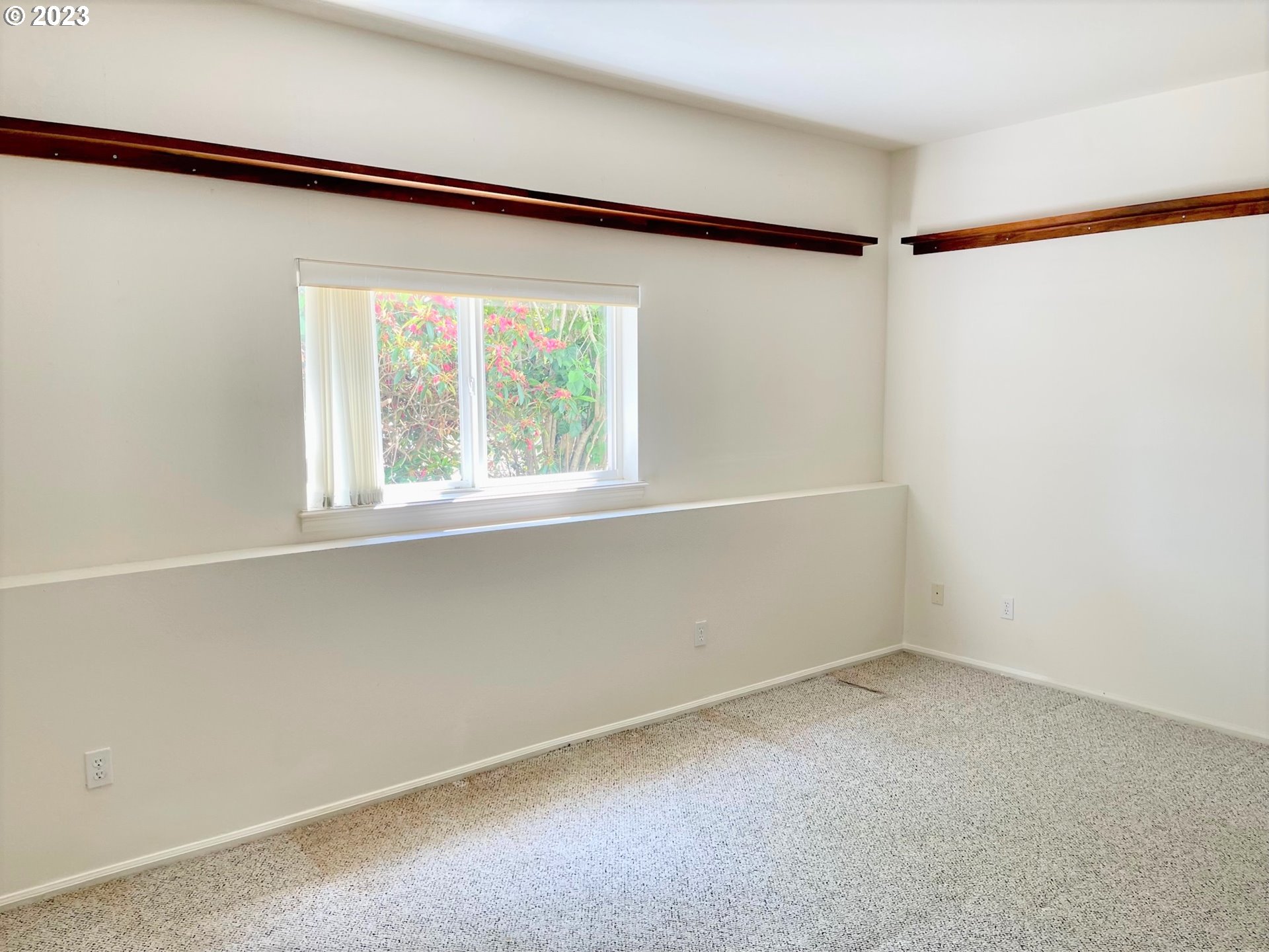 919 3rd Street Brookings, OR 97415 - Photo 32 of 36 an empty room with a window