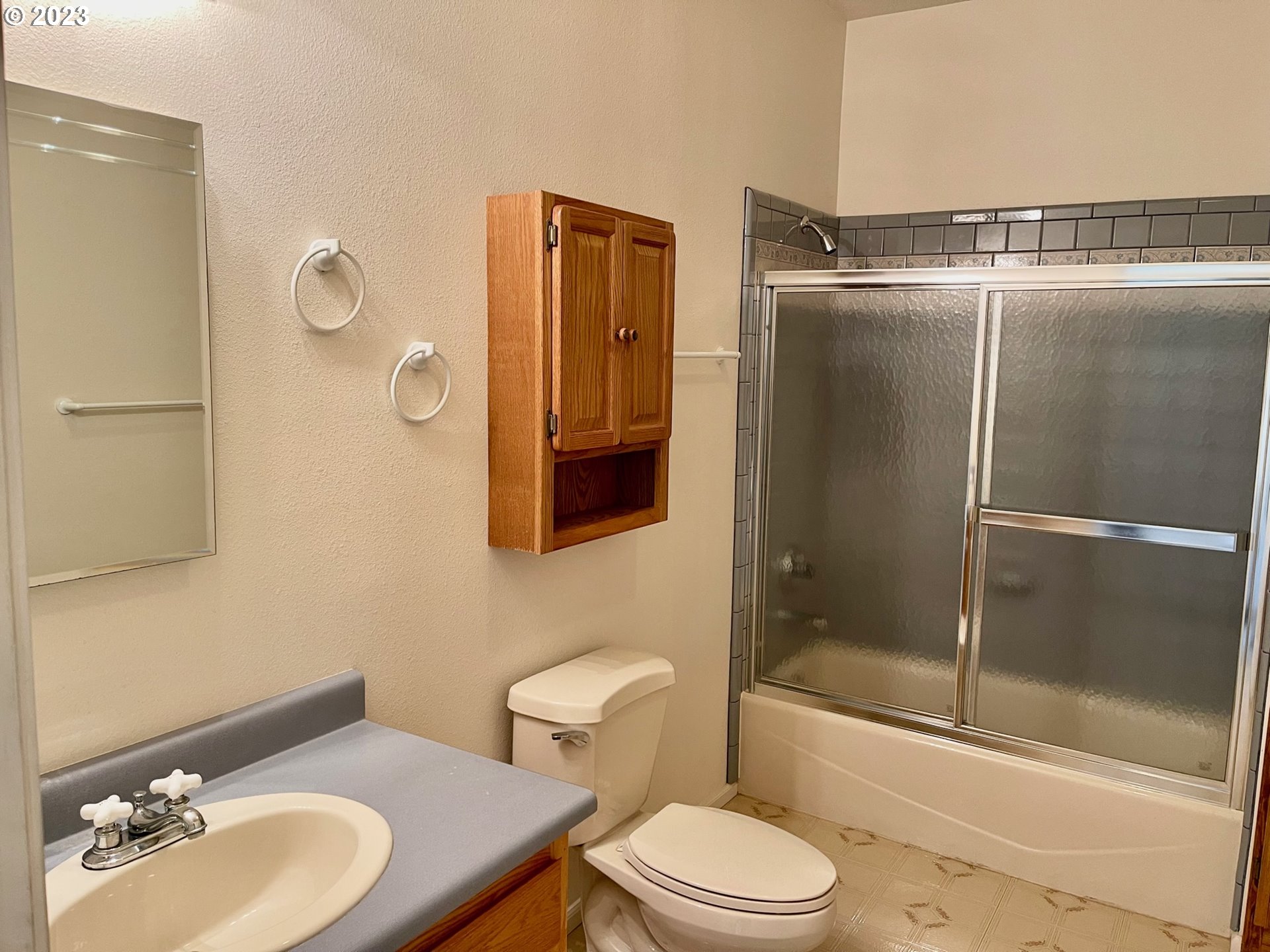 919 3rd Street Brookings, OR 97415 - Photo 33 of 36 a bathroom with a sink toilet and shower
