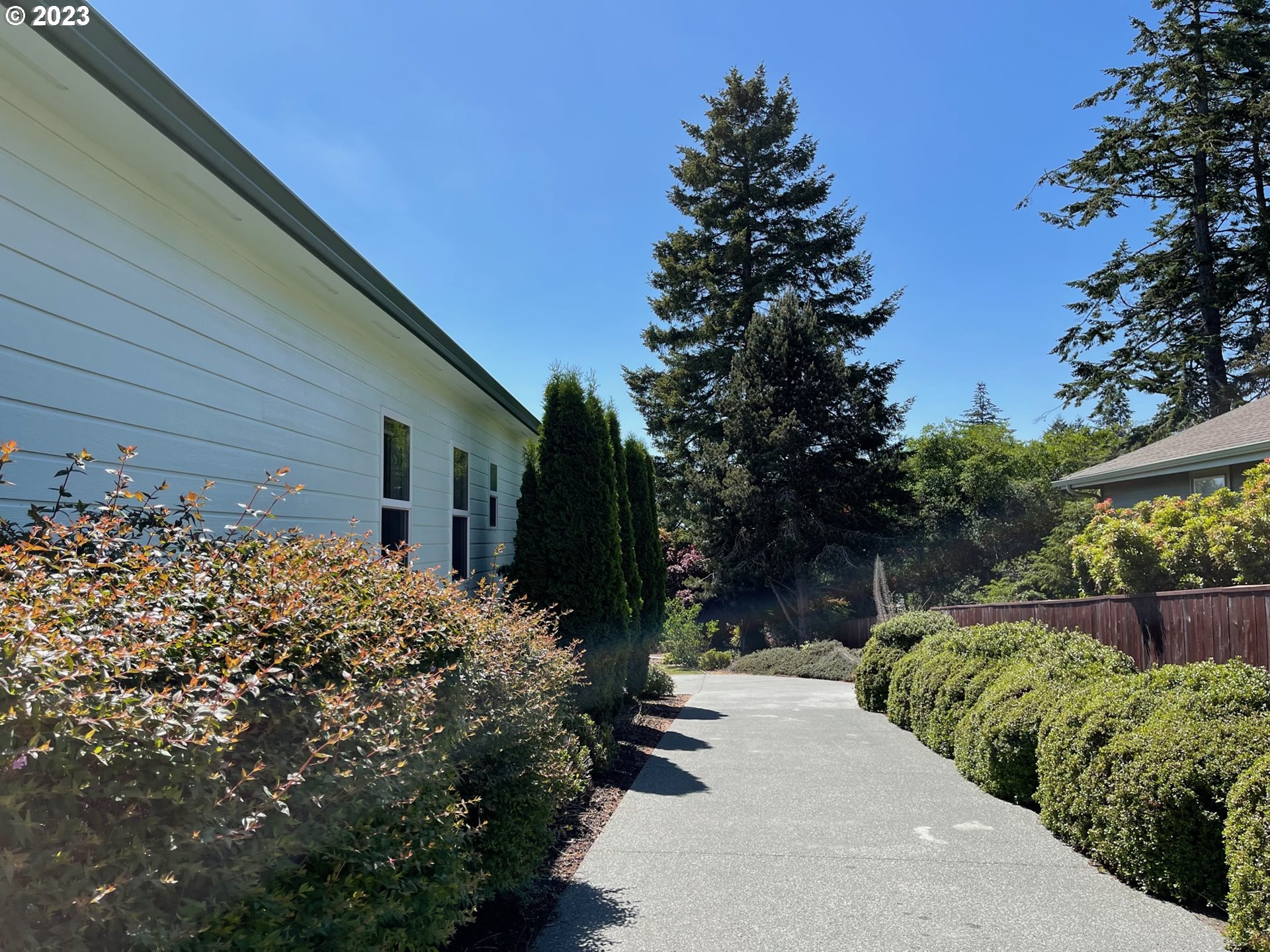919 3rd Street Brookings, OR 97415 - Photo 5 of 36 a view of a house with a yard
