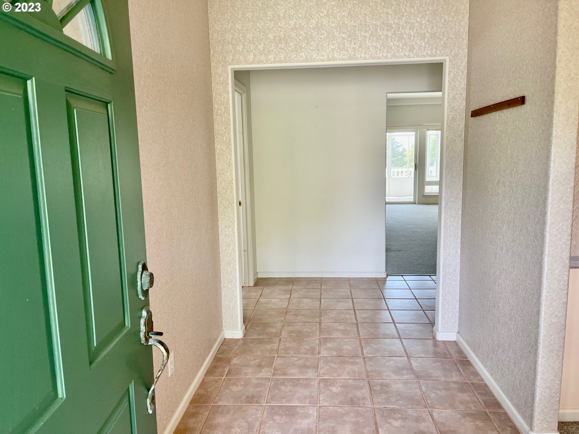 919 3rd Street Brookings, OR 97415 - Photo 7 of 36 a view of a room that has a mirror