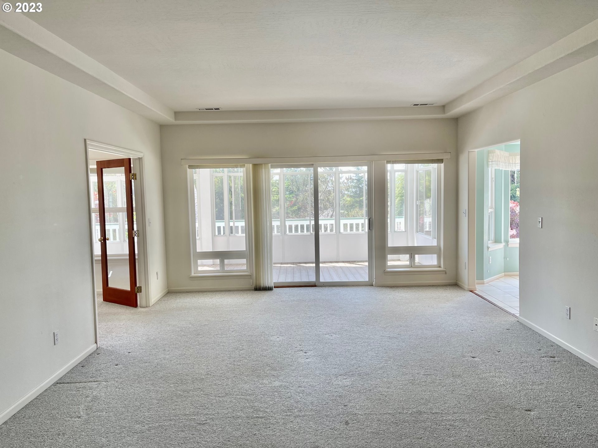 919 3rd Street Brookings, OR 97415 - Photo 10 of 36 a view of an empty room with glass door