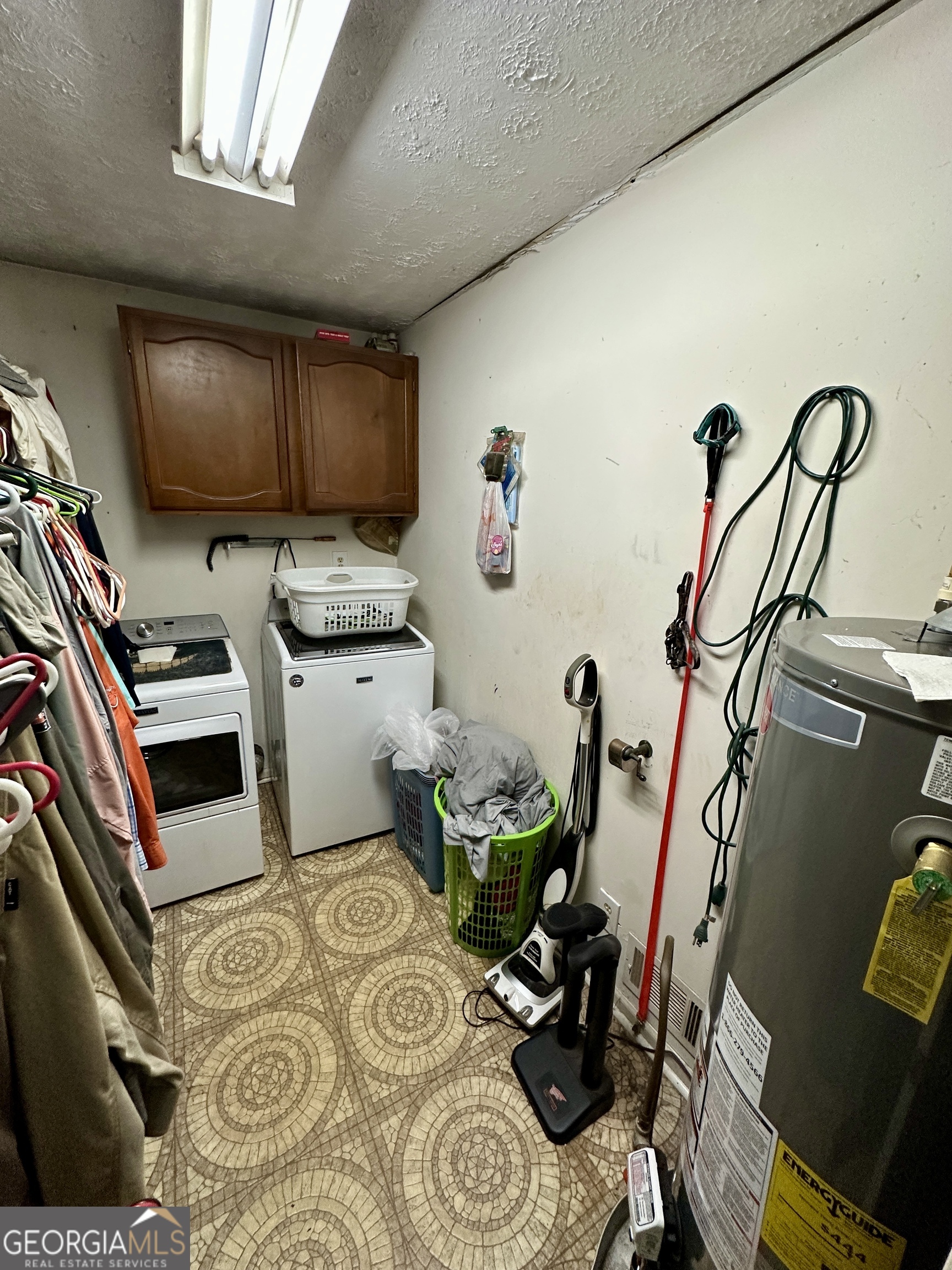 171 Hoyt Road Milner, GA 30257 - Photo 22 of 26 a room with storage and utility