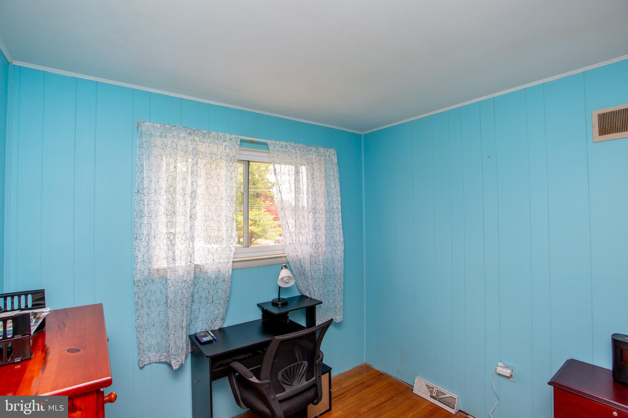 1264 Tulip Road Warminster, PA 18974 - Photo 16 of 21 a room with furniture and a window