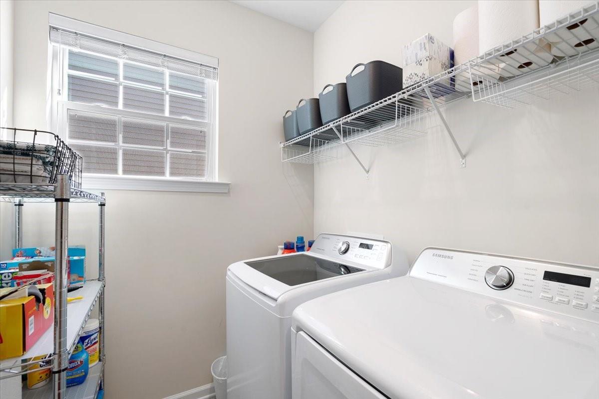 7730 Sea Turtle Way Lancaster, SC 29720 - Photo 12 of 24 a utility room with dryer and washer