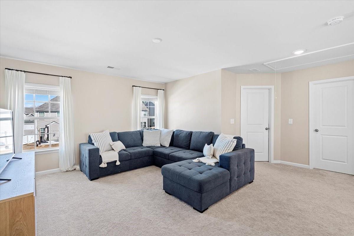 7730 Sea Turtle Way Lancaster, SC 29720 - Photo 13 of 24 a living room with furniture and a window