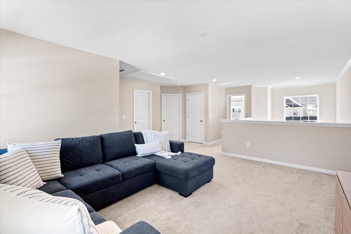 7730 Sea Turtle Way Lancaster, SC 29720 - Photo 14 of 24 a living room with furniture and a couch