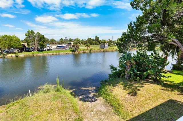 a view of a lake with a houses