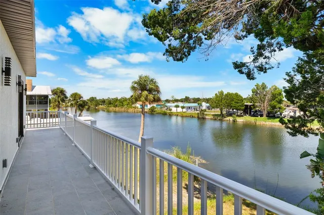 a view of a lake from a balcony