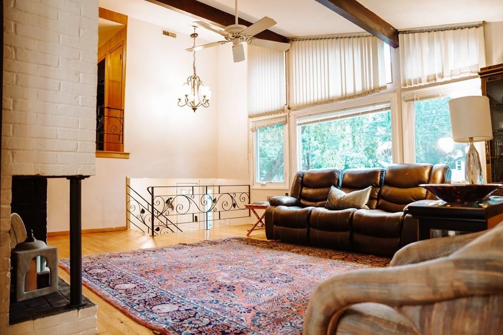 17 Brandeis Road Newton, MA 02459 - Photo 3 of 24 a living room with furniture a large window and a rug
