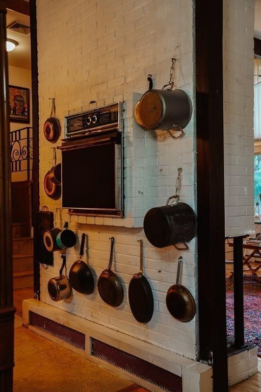 17 Brandeis Road Newton, MA 02459 - Photo 6 of 24 a kitchen has a stove and a wooden floor