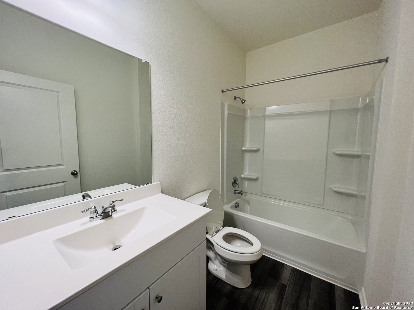 8907 Colony Meadow Converse, TX 78109 - Photo 15 of 31 a bathroom with a sink a toilet and shower