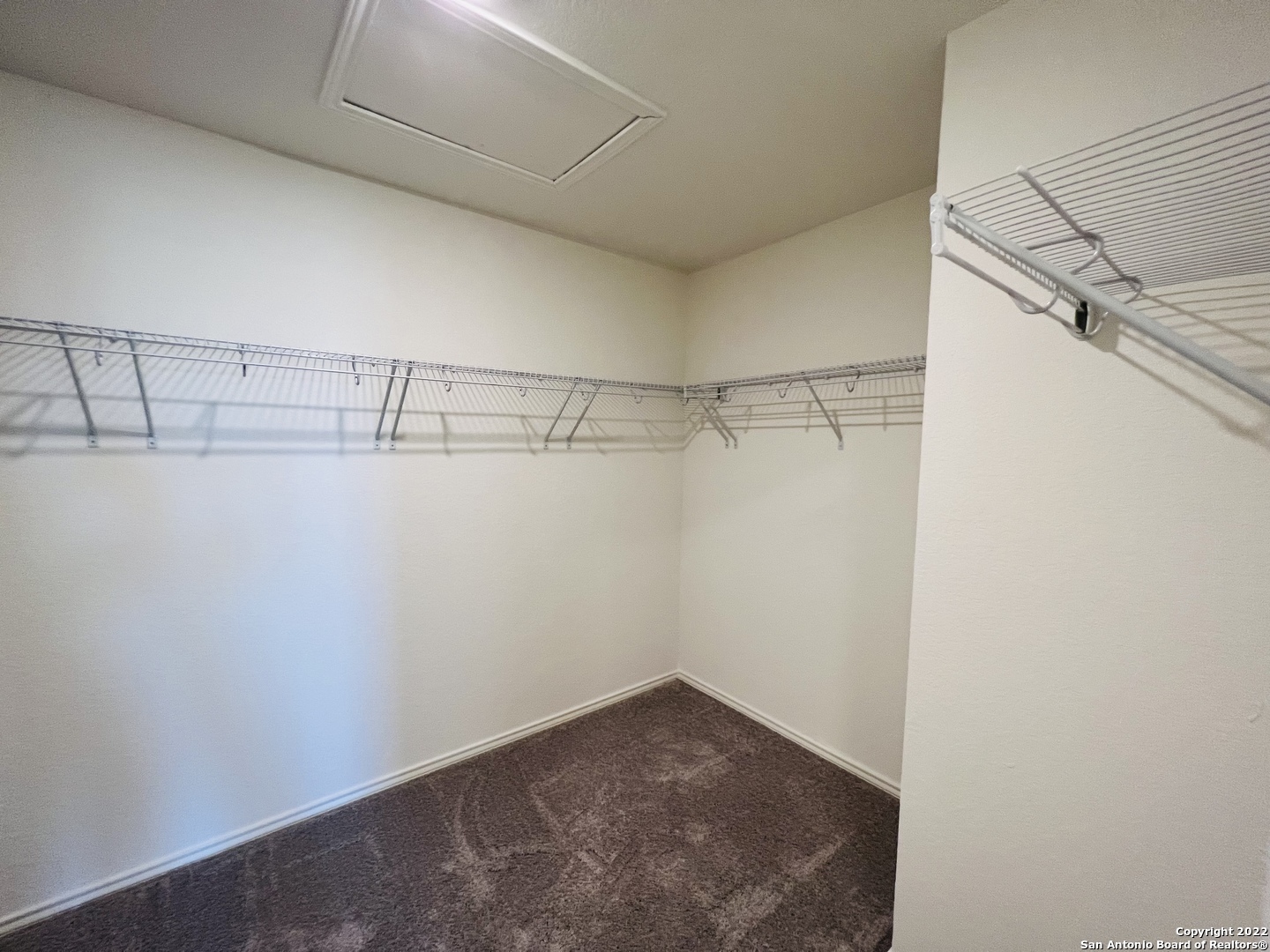 8907 Colony Meadow Converse, TX 78109 - Photo 24 of 31 a view of a room with racks on the wall