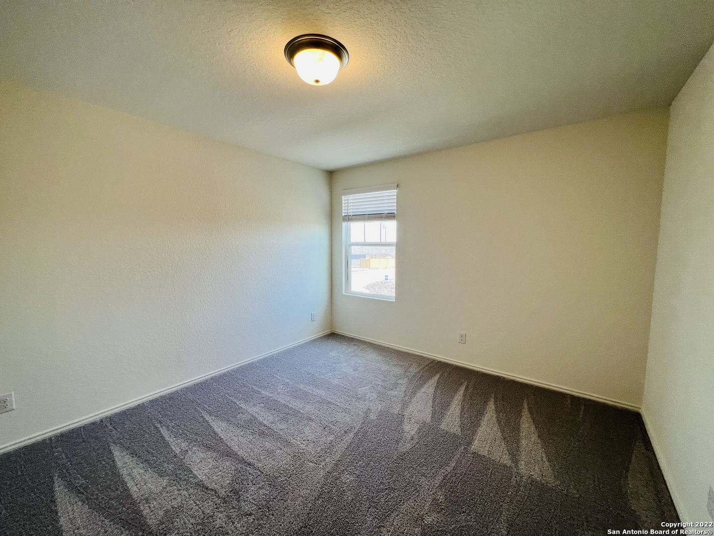 8907 Colony Meadow Converse, TX 78109 - Photo 25 of 31 an empty room with a window