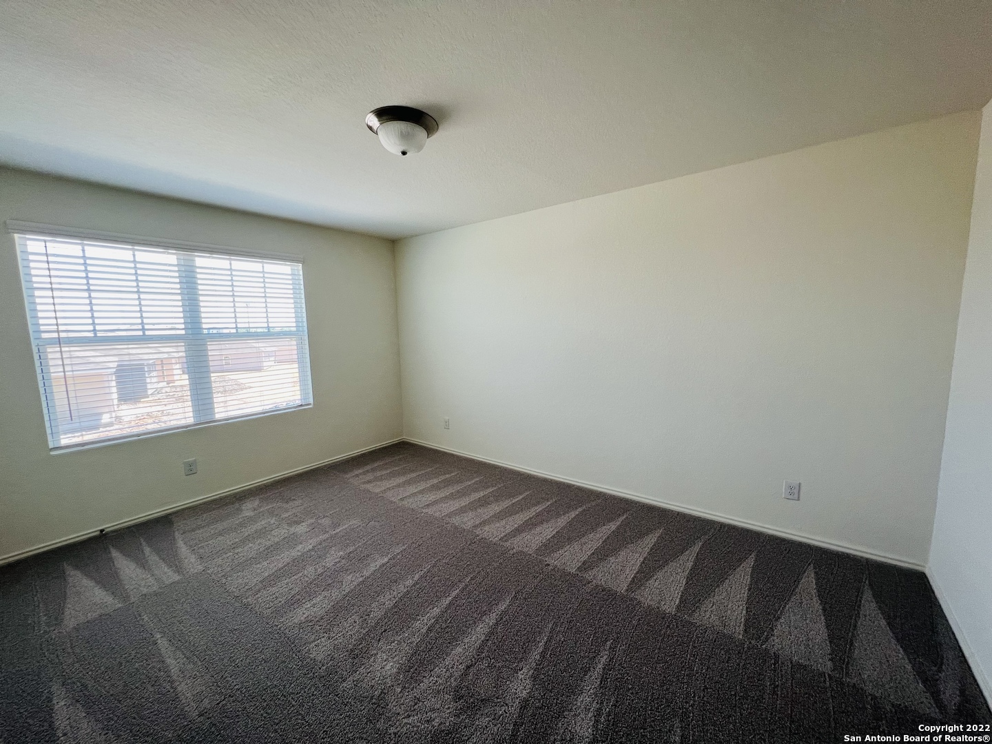 8907 Colony Meadow Converse, TX 78109 - Photo 27 of 31 an empty room with a window