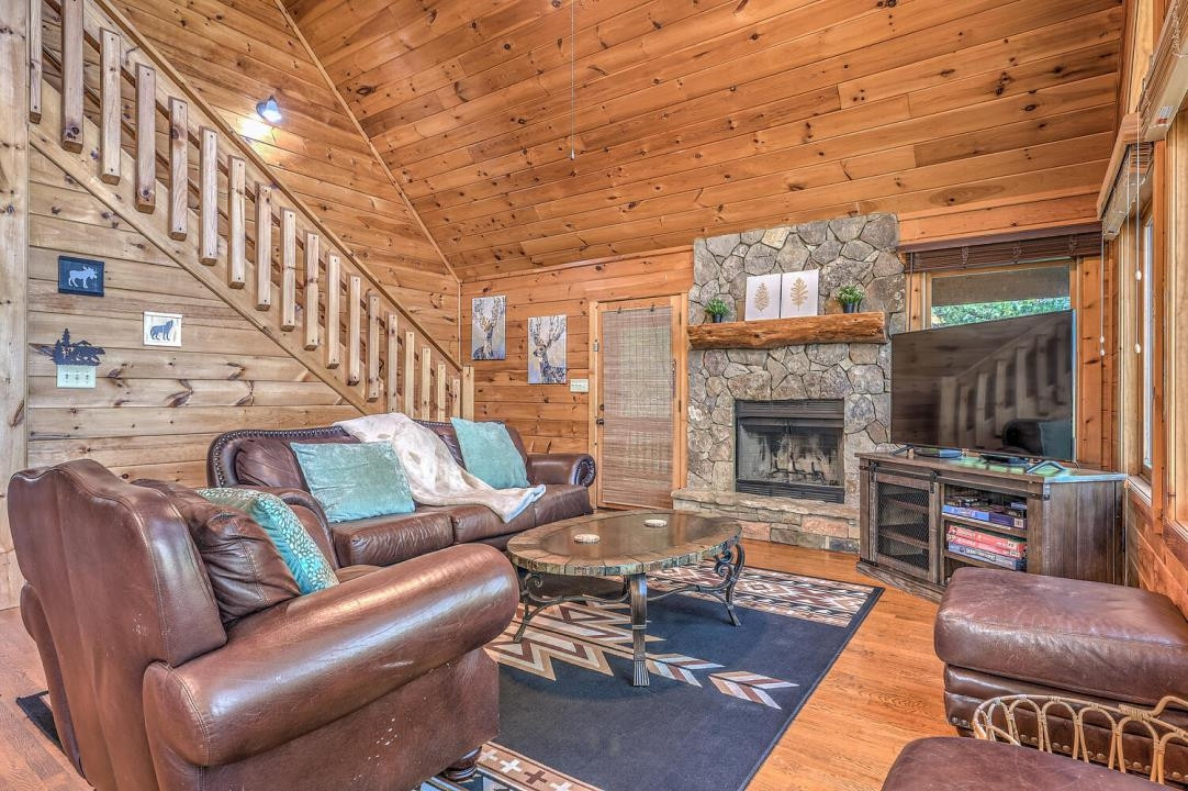 398 Pin Oak Road Murphy, NC 28906 - Photo 14 of 30 a living room with furniture and a fireplace