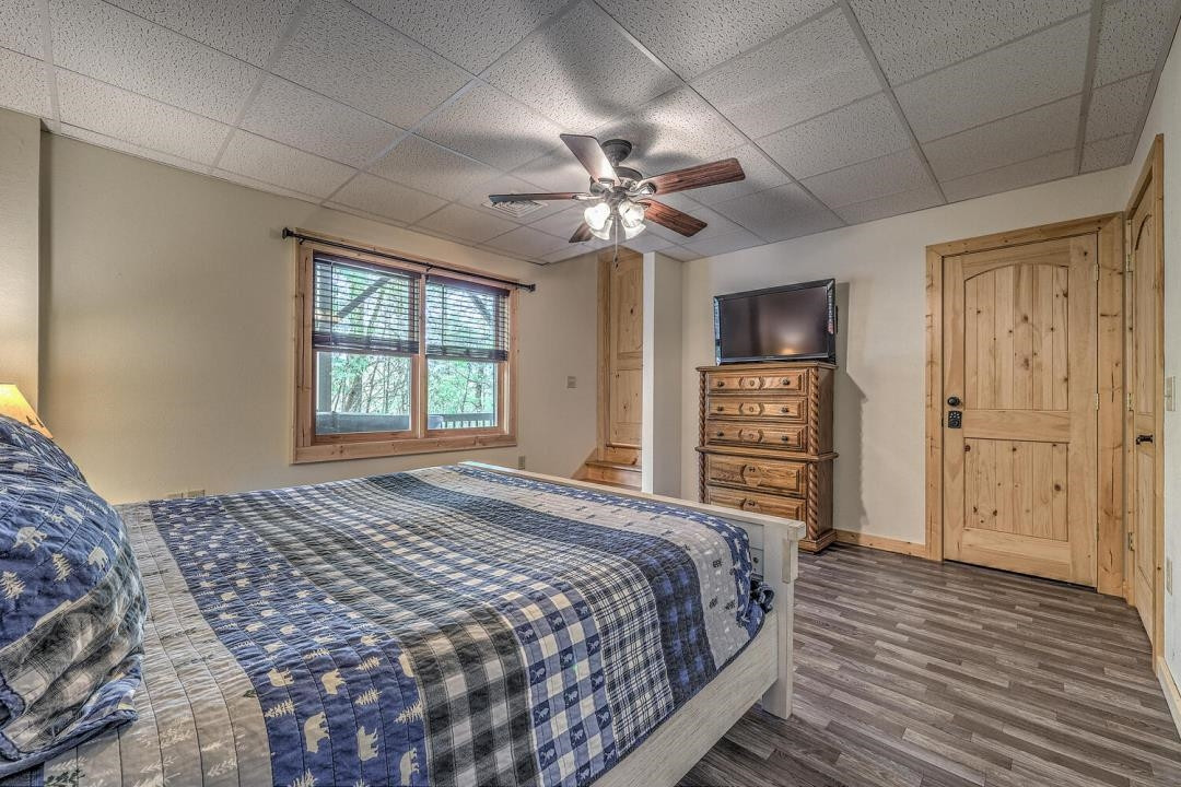 398 Pin Oak Road Murphy, NC 28906 - Photo 29 of 30 a bedroom with a bed ceiling fan and a window
