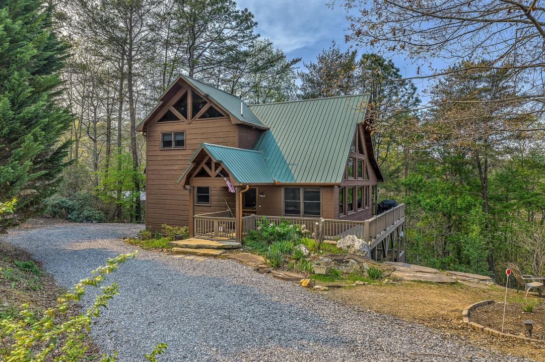 398 Pin Oak Road Murphy, NC 28906 - Photo 7 of 30 a front view of house with yard and trees in the background