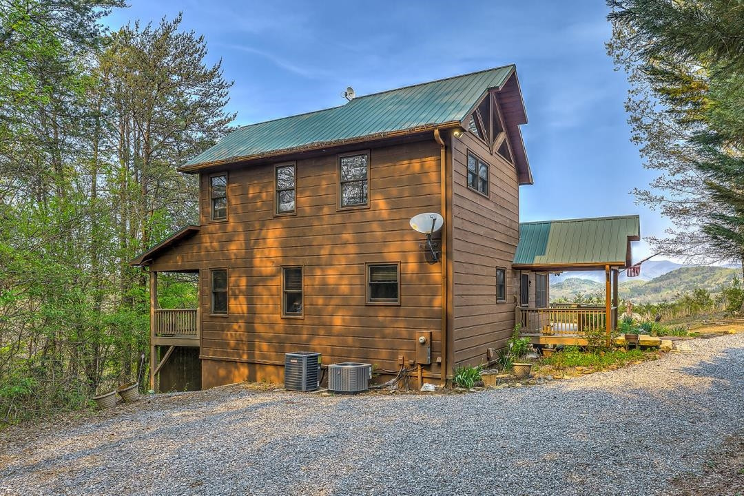 398 Pin Oak Road Murphy, NC 28906 - Photo 8 of 30 a front view of a house with a yard